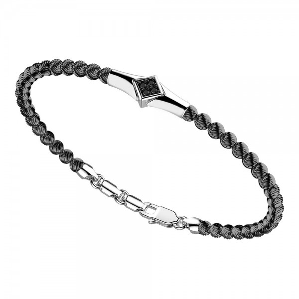 Bracciale in argento con sfere decorate e spinelli neri.