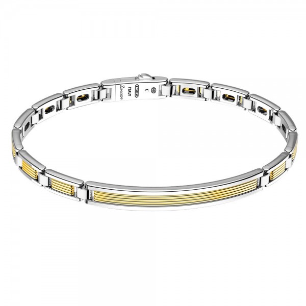 Bracciale in oro ed argento con placca.