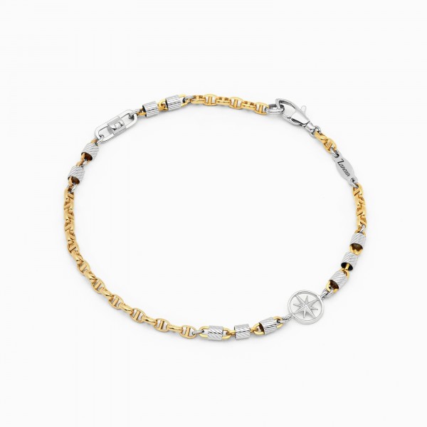 Bracciale in oro giallo e bianco e icona centrale rosa dei venti.